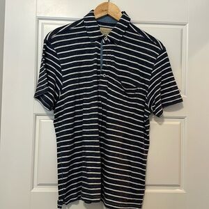 True Grit polo.  Dark blue with white stripe.  Size M